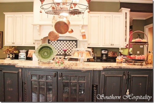 black and antique white cabinets