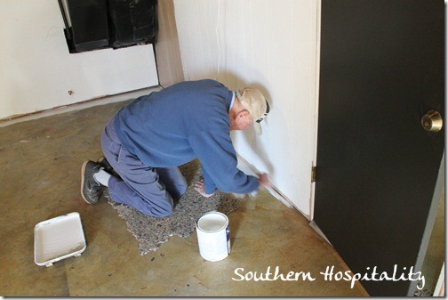 Dad painting floor