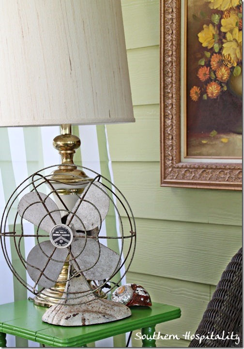 brass lamp and vintage fan