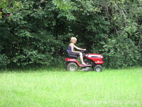 mowing backyard