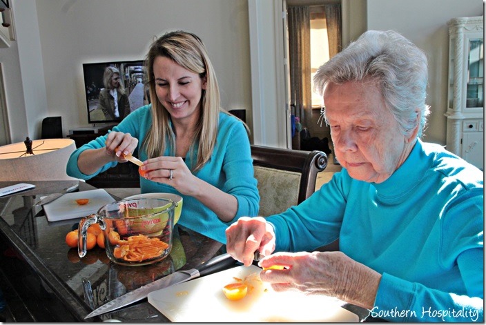 cutting up oranges