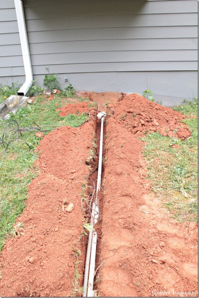 irrigation pipes going to garage