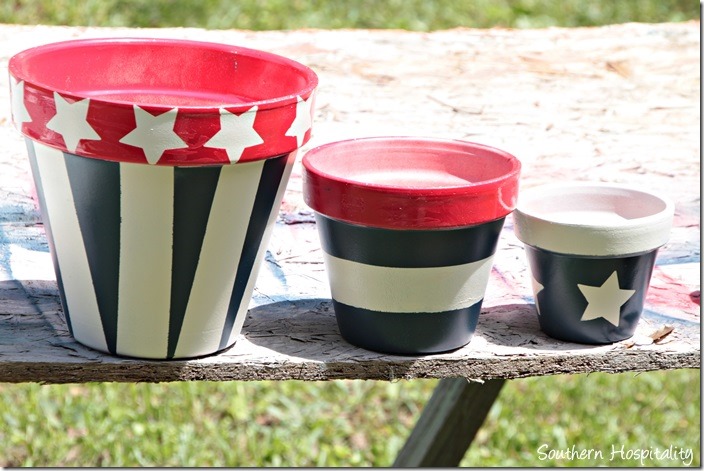 clay pots red white and blue