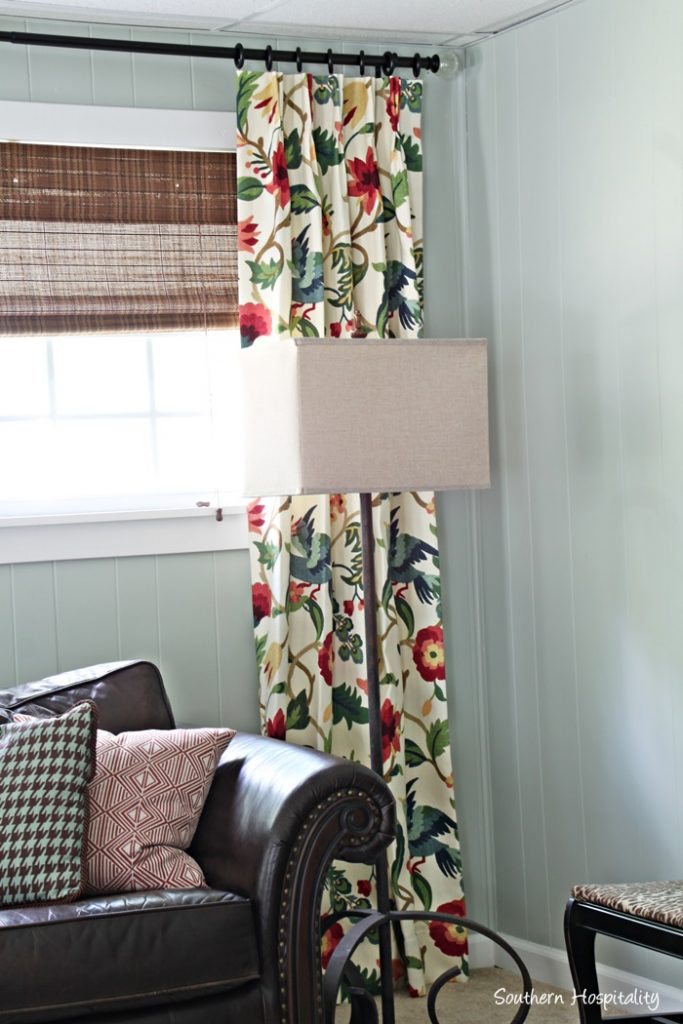 den corner with drapes