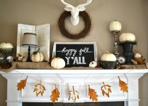 Fall Mantel featuring deer mount, pumpkins, chalkboard tray and fall leaf banner -- Sondra Lyn at Home.com
