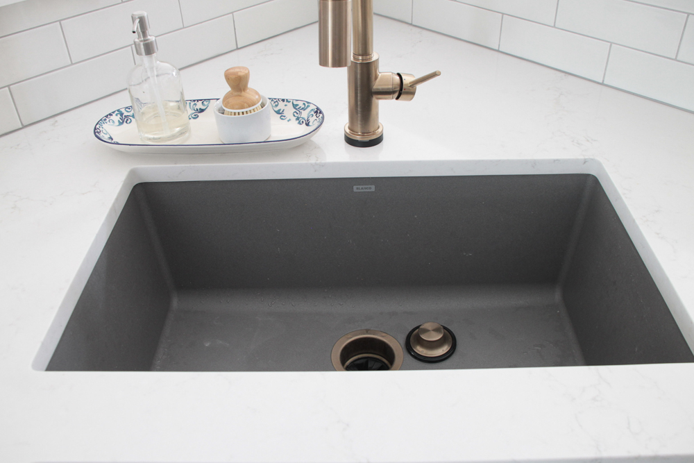 blanco kitchen sink metallic gray backsplash